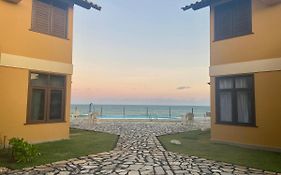 Casa de praia em condomínio à beira mar